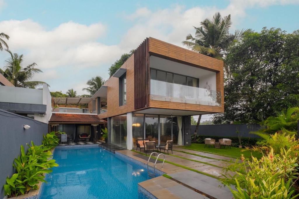 SaffronStays Candolim Deck Luxe 3BR Poolside Villa